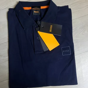 Polo Boss bleu pour homme – style moderne et raffiné