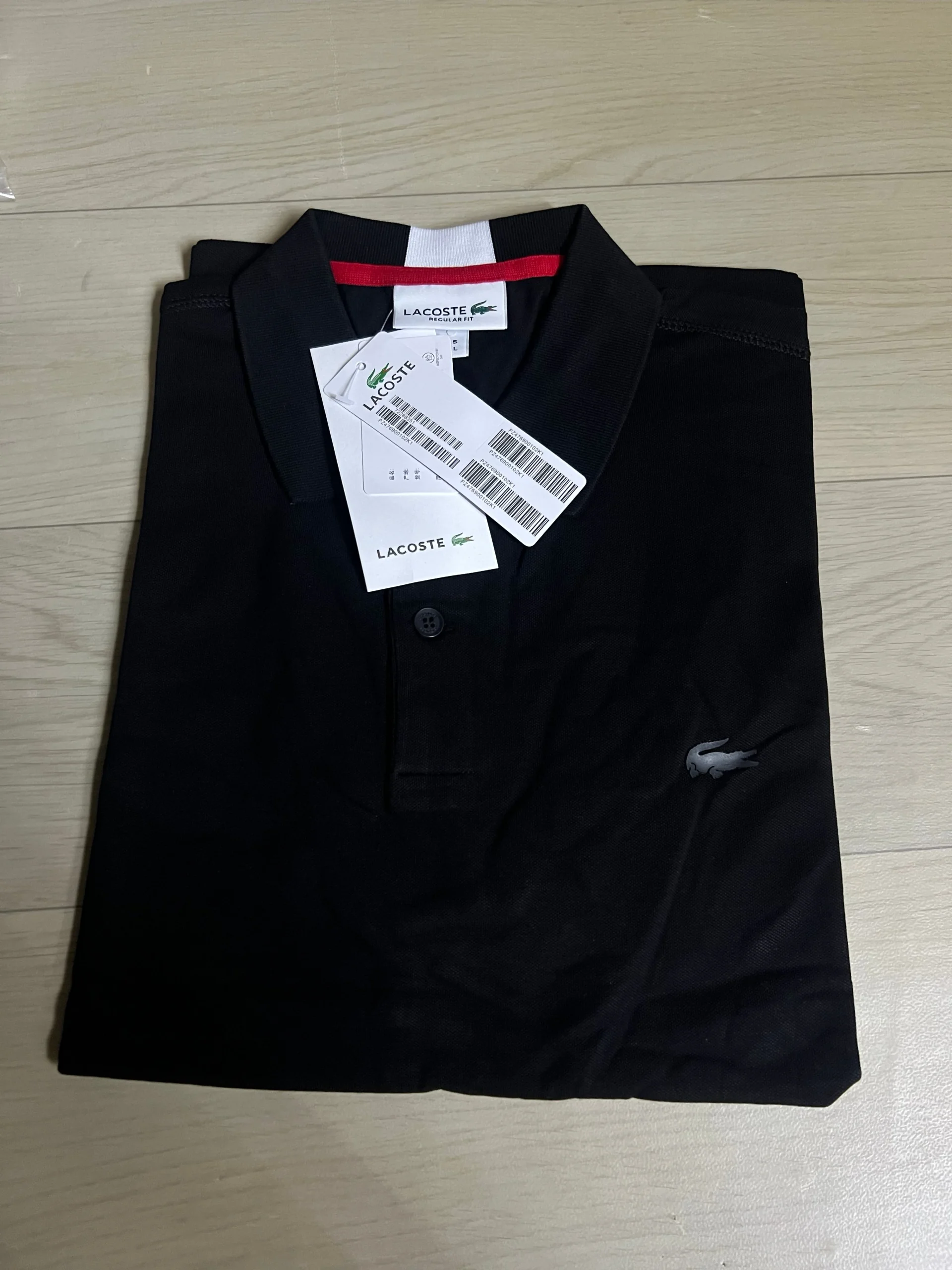 Polo Lacoste noir pour homme – élégance intemporelle et confort absolu