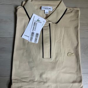 Polo Lacoste beige pour homme – style classique et élégant