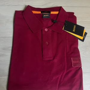 Polo Boss rouge bordeaux pour homme – élégance et caractère